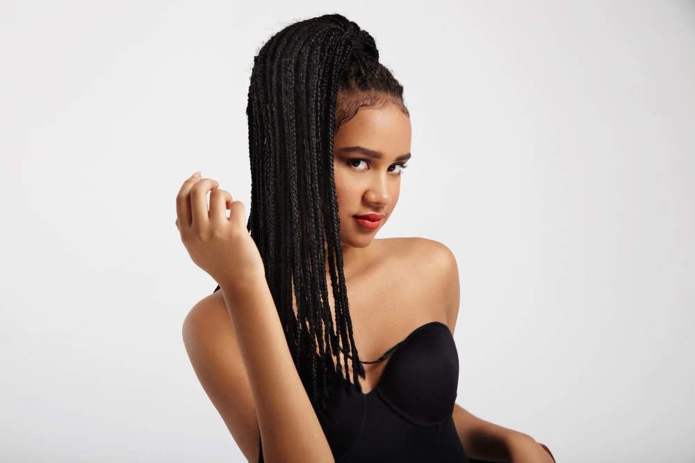 Black woman wearing a natural-looking human hair wig